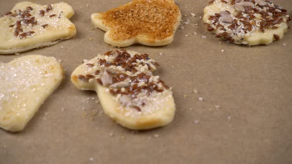 The process of making cookies from shortbread dough.