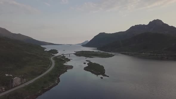 Midnight Sun in Napp/Flakdstad, Lofoten Islands, Norway Aerial Drone 4K