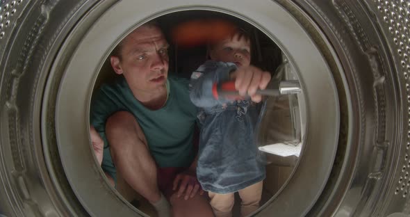 Dad Hands Repairing Washing Machine He Twists Screwdriver Drum Tightens Screws