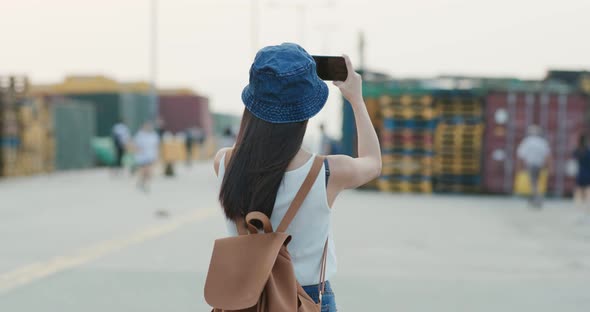 Woman Take Photo on Cellphone in Sai Wan Freight Terminal