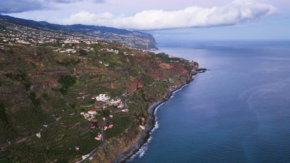 Drone hyperlapse over dramatic Madeira coastline shows terraced fields