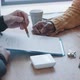Close up of hands of mature agent discussing contract with two clients - VideoHive Item for Sale