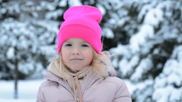 Sad Little Girl Portrait in Winter