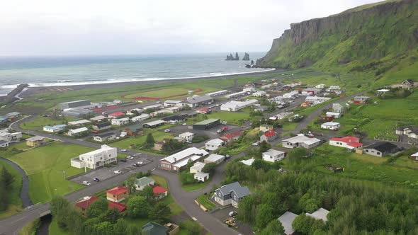 Vik, Iceland skyline with drone video moving forward.