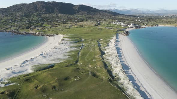 Gurteen And Dog's Bay Beach With The Coastal Mountains On The Background In Connemara, Ireland.  - a