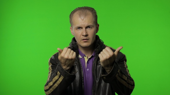 Rocker Man Asking To Subscribe, Trying To Control, Pointing Fingers Down. Chroma Key Background