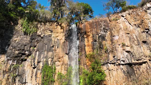 Waterfall at scenic  gorge canyons formation. Rural landscape.