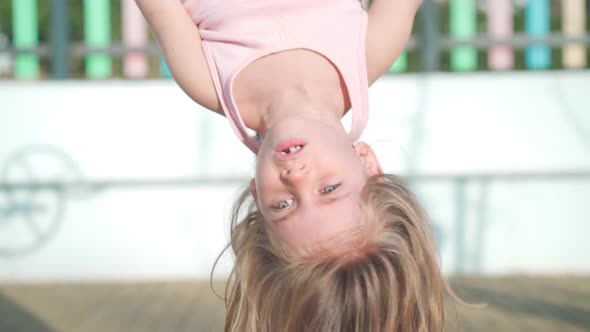 Child Playing on Playground Warm Summer Day