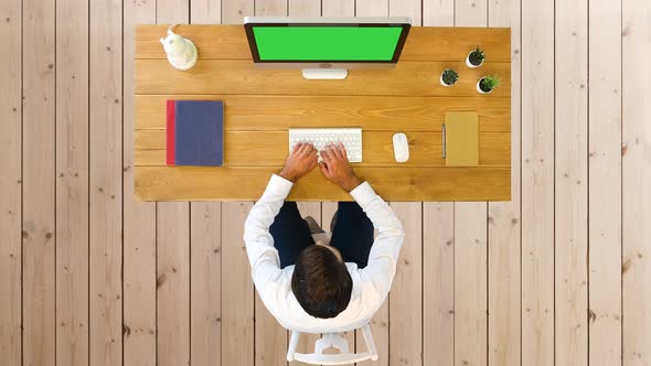 Caucasian Male Business Man Looking at Computer Screen and Working