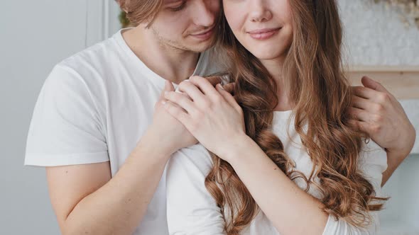 Cropped Shot Young Man Hugs Caucasian Woman Cuddling Stroking Hair