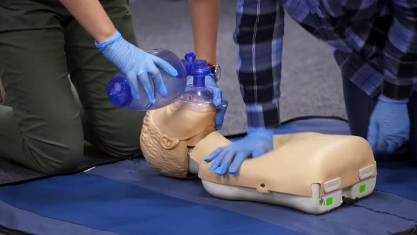 Medical male dummy on blue hospital blanket. Medical equipments for education.