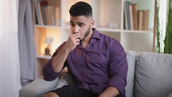 Pensive Guy Home Contemplation Sad Man on Couch