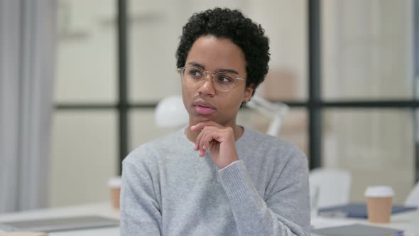 Portrait of Pensive African Woman Thinking 