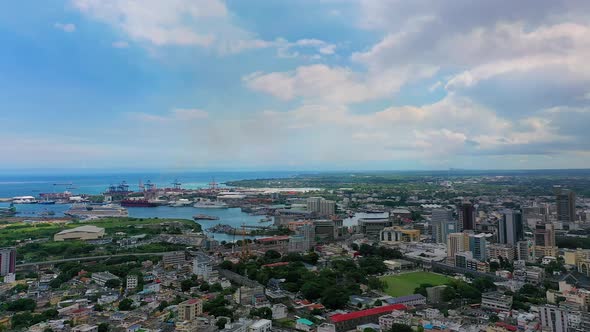 Mauritius, Port Louis under blue sky with clouds