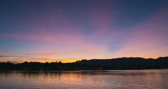 Time lapse sunrise colorful sky over Bandaneira village Indonesia Banda Islands