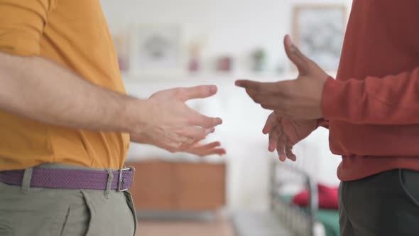 Gesture of Two Men having a Discussion