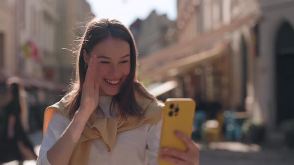 Cheerful Deaf Woman Having Video Call on Smartphone