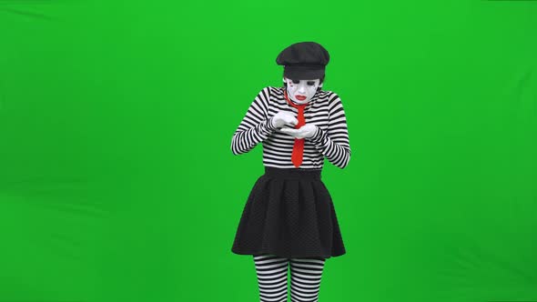 Mime Girl Crying, Collecting Tears in a Palm