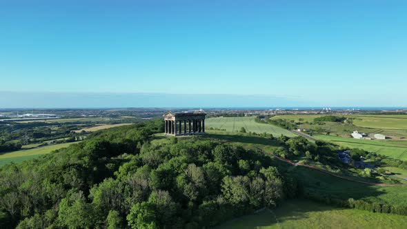 Aerial wide cinematic, camera circles on Penshaw Monument in Sunderland, North East, UK. 4K