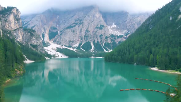 Beautiful Landscape of Braies Lake Lago Di Braies Romantic Place with Wooden Bridge and Boats on the