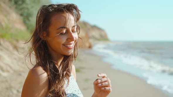 Slow Motion of Happy Joyful Slim Fitbody Woman Wearing in Bikini and Enjoying Wind and Waves on Sea