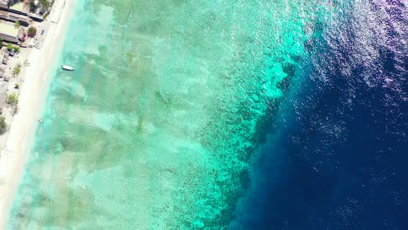 Natural aerial abstract shot of a white sandy paradise beach and blue ocean background in colourful 