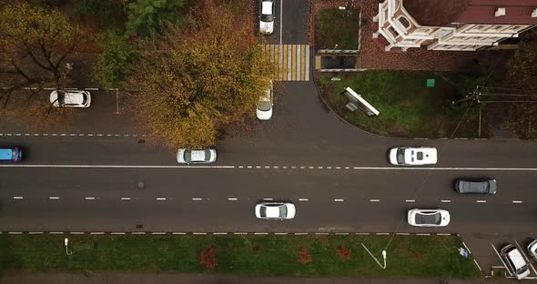 Top Down Drone Point of View - Steet City Road Intersection in Autumn Time