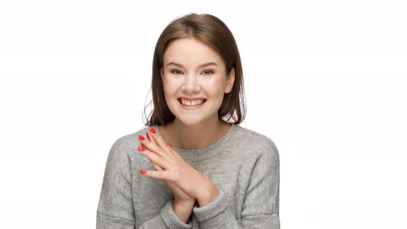 Portrait of Beautiful Woman with Caucasian Appearance Expressing Unexpectedness or Astonishment