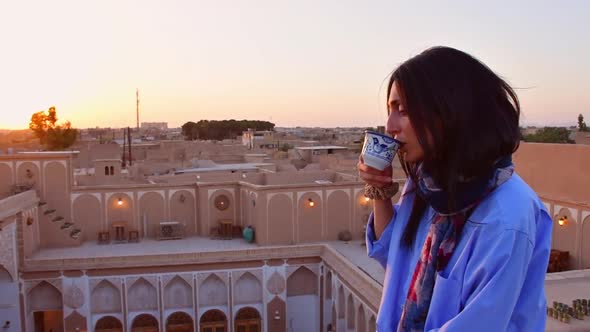 Woman Drink Coffee From Decorated Iranian Cup