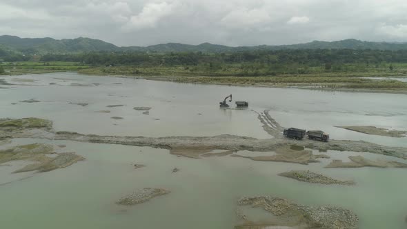 Cleaning and Deepening By a Dredger on the River. Philippines, Luzon