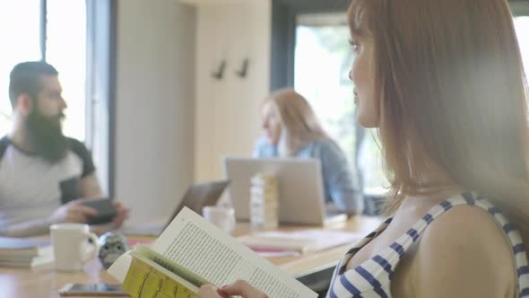 Students studying in library