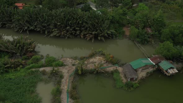 orbit drone shot of wetlands on the outskirts of Ho Chi Minh City, Vietnam.