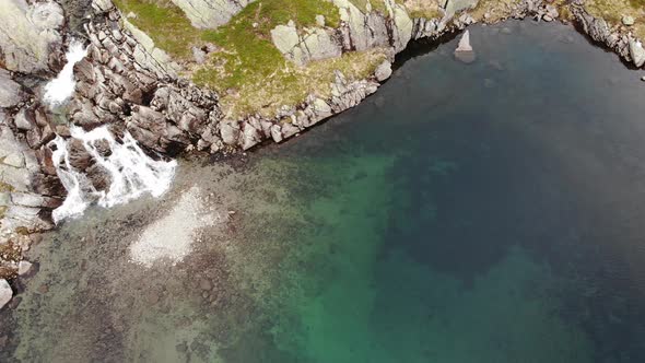 Little Waterfall In Mountains, Norway. Aerial View.