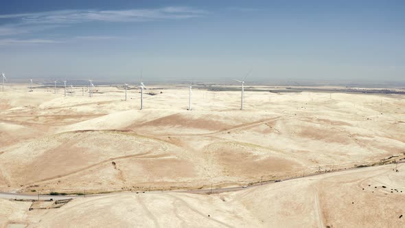 Aerial View of Working Wind Power Generators From Afar alt
