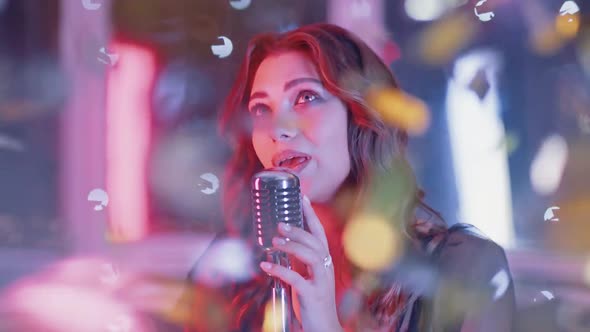 Portrait of a Young Female Singing in a Nightclub Party Closeup of a Woman's Face in Neon Light