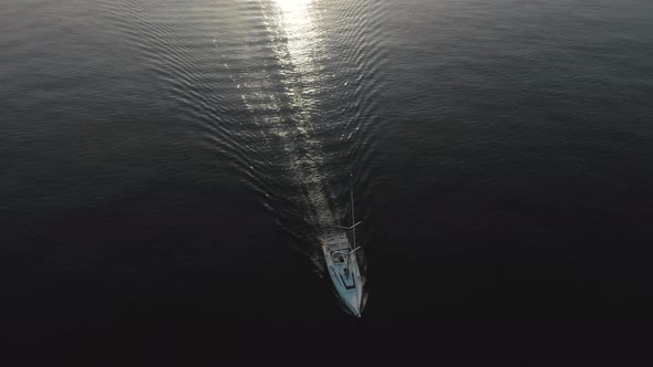 Aerial View of Yacht Near Rocky Island of Mallorca