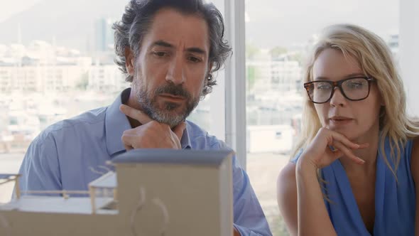 Two architects working in an office