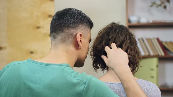 Gentle Husband Caressing His Wife's Hair, Doing Relaxing Massage, Caring Partner