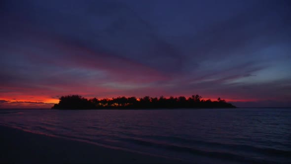 View of a scenic tropical island in Fiji at sunset