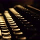 A man or woman works on a typewriter.  - VideoHive Item for Sale