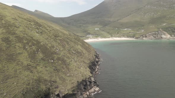 Beautiful Blue Waters And White Sand In A Cove In Achill Island - aerial shot