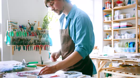 Young master in uniform at work