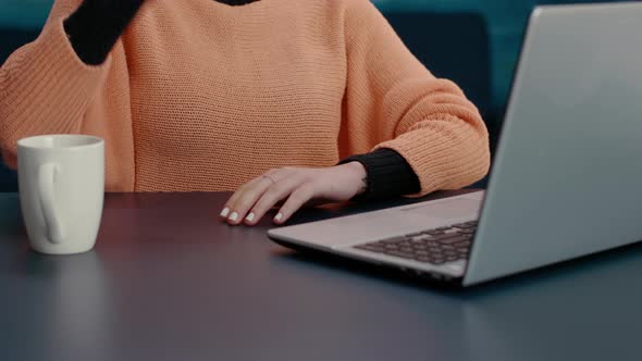 Young Woman Attending Remote Meeting on Videoconference alt