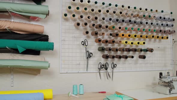 Workshop of tailor studio, tailoring wear to order. interior of small fashion studio