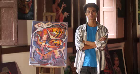 Asian Artist Pose With His Picture