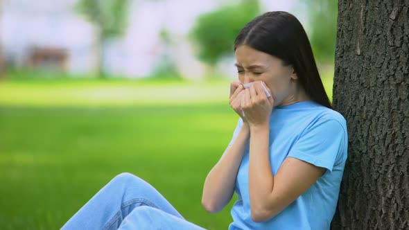 Young Woman Sneezing Tissue Sitting Tree, Suffering Spring Allergy, Medicine