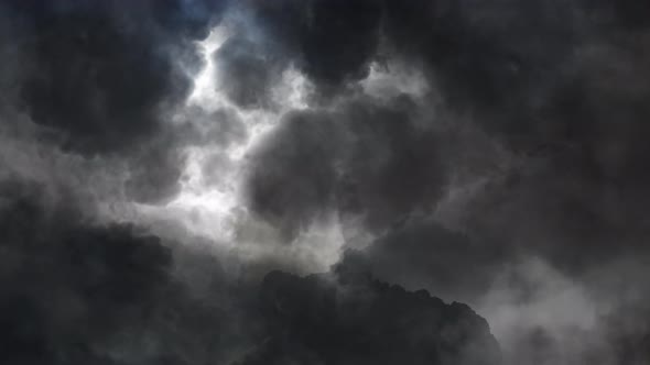 4k  thunderstorm in a dark cumulonimbus cloud