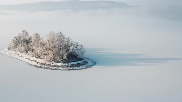 Picturesque View Of Bird Island On A Misty Winter Afternoon - aerial shot