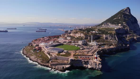 Aerial View Of Gibraltar's Europa Point With Lighthouse. drone pullback