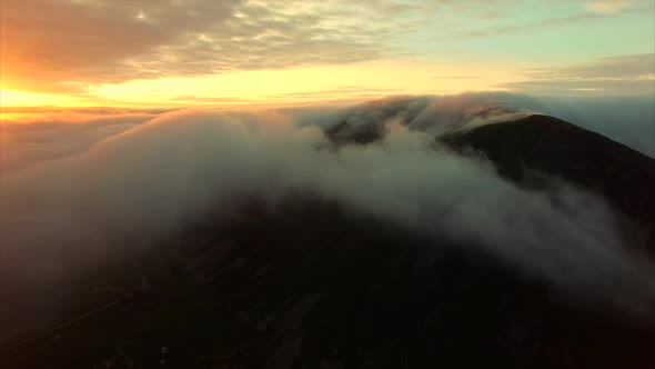 Midnight sun above the clouds on Lofoten islands